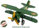 Un avion biplan du type Curtiss vert et jaune du style jouet ancien en métal