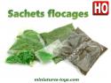 Un ensemble de 5 sachets de flocage pour réseaux de trains décors et dioramas